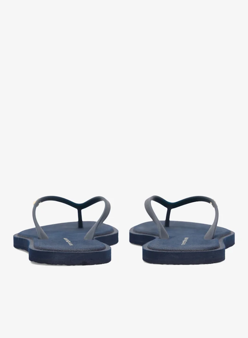 TOMMY HILFIGER  Chic Enamel Flag Flip-Flops for Women | Best Price UAE